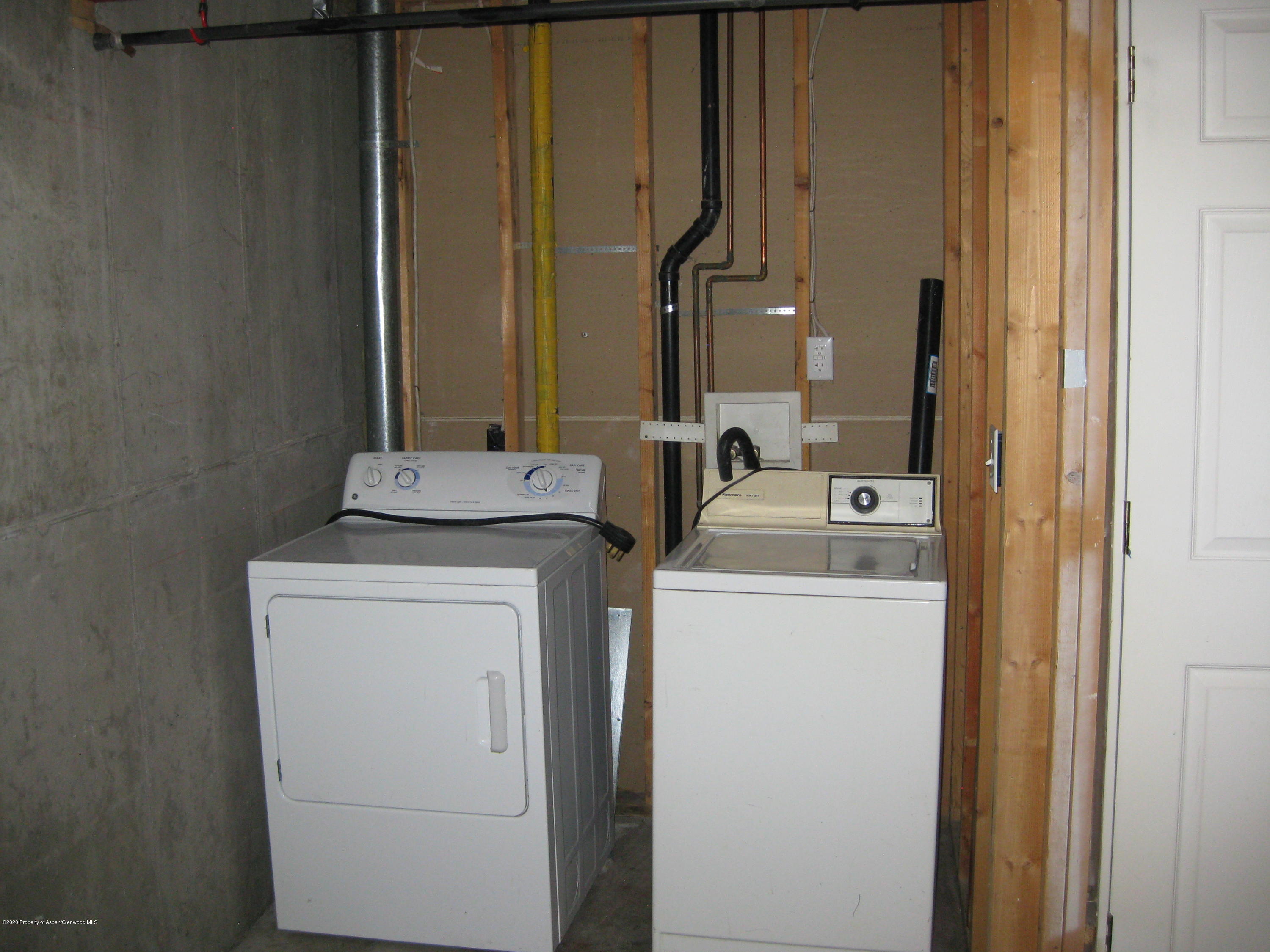 1588 Anvil View Avenue Rifle, CO 81650 - Photo 13 of 15 a utility room with dryer and washer