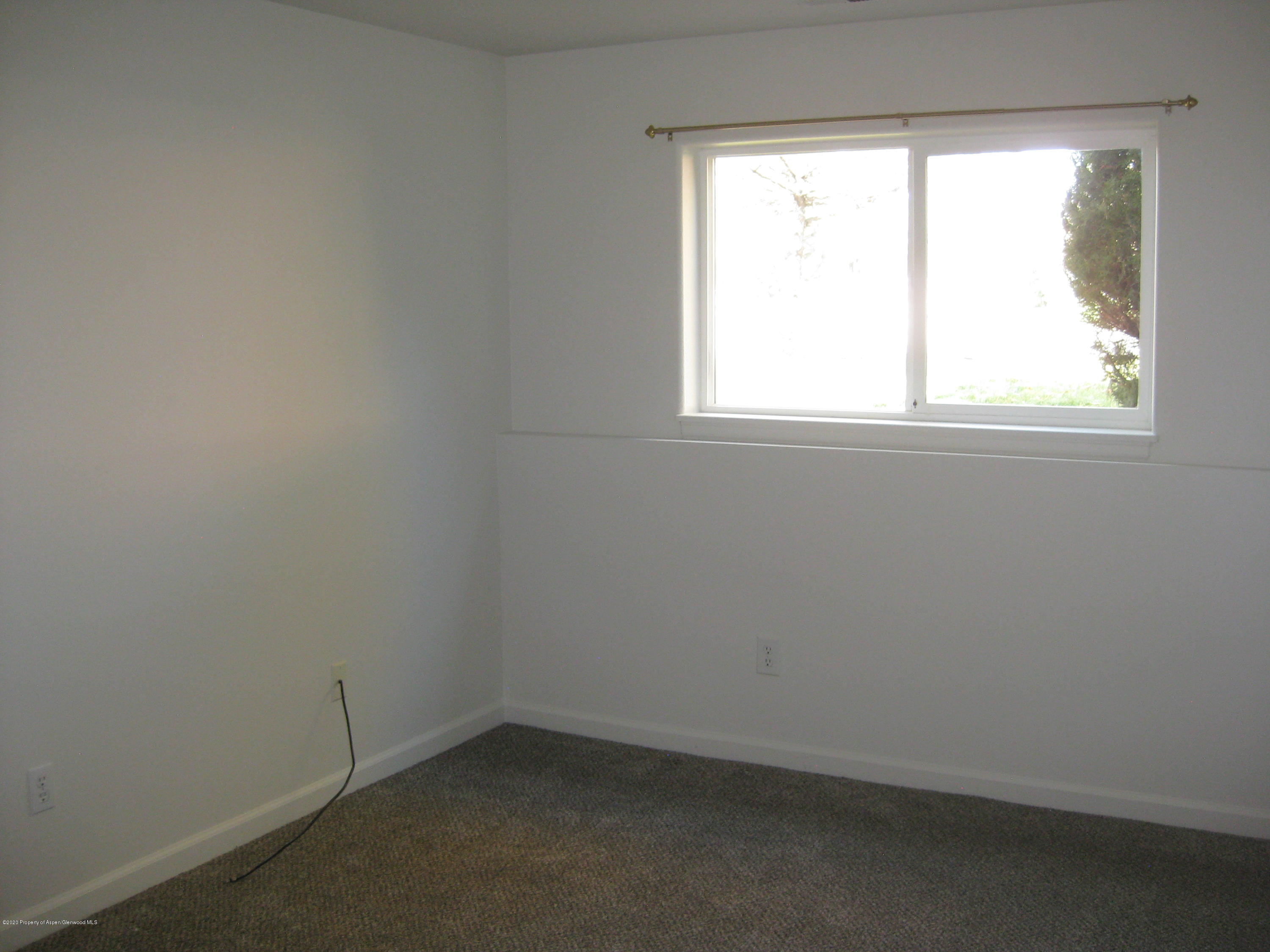 1588 Anvil View Avenue Rifle, CO 81650 - Photo 10 of 15 an empty room with a window