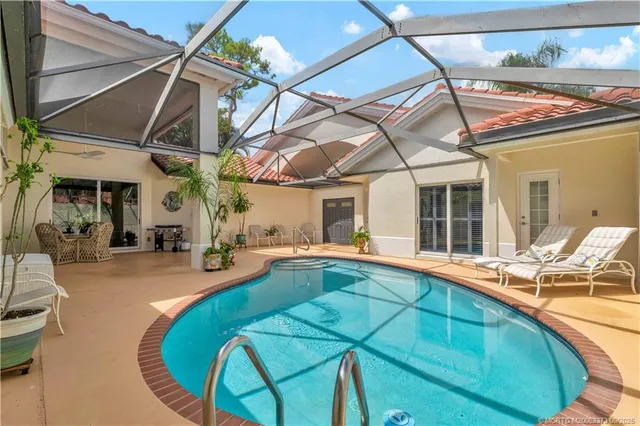 a view of a house with swimming pool