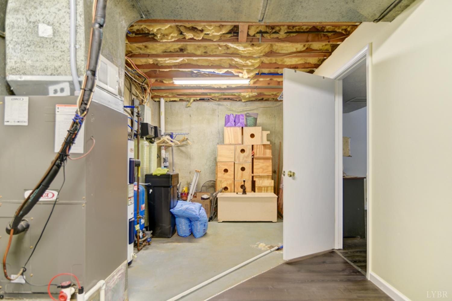 223 Cahas Mountain Road Boones Mill, VA 24065 - Photo 32 of 50 a view of water heater room with stairs