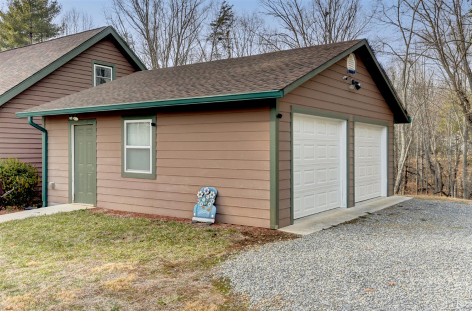223 Cahas Mountain Road Boones Mill, VA 24065 - Photo 35 of 50 a front view of a house with a yard