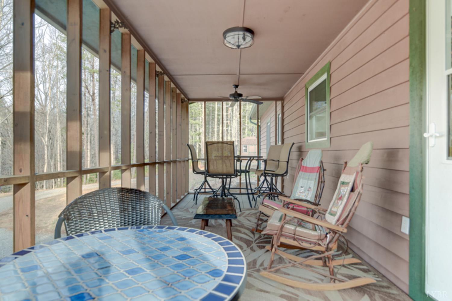 223 Cahas Mountain Road Boones Mill, VA 24065 - Photo 42 of 50 a view of a dining room with furniture window and outside view