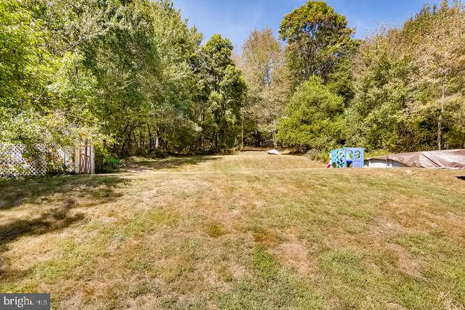 1158 Ridge Road Pylesville, MD 21132 - Photo 27 of 35 Open area of backyard - Over 6 acres total