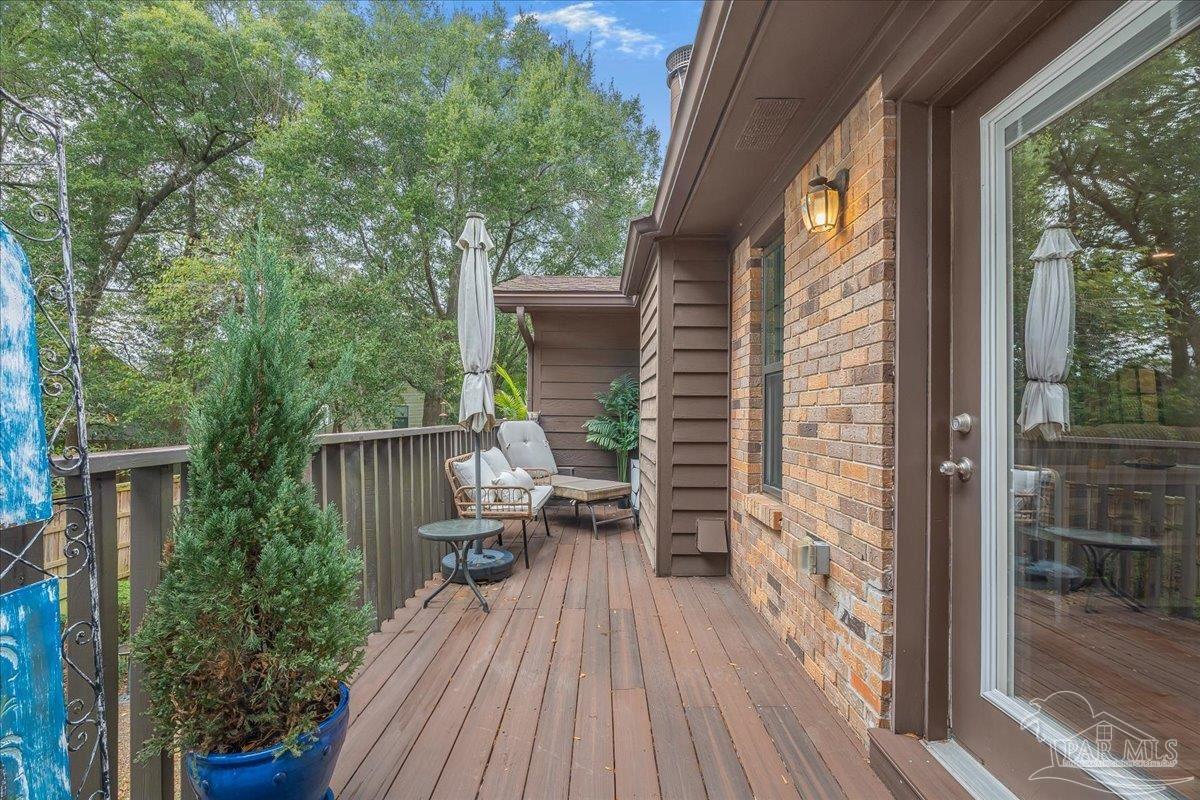 4831 East Olive Road, Unit 1D Pensacola, FL 32514 - Photo 25 of 36 a view of deck with patio