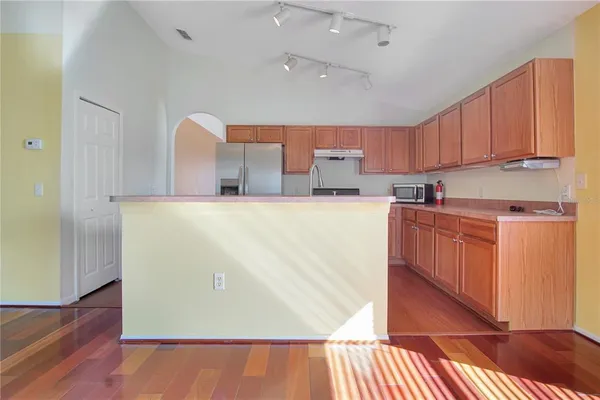 a view of a kitchen with a sink and dishwasher