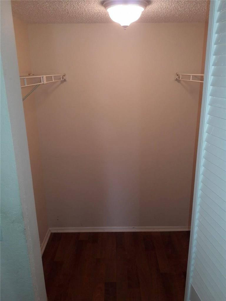 8605 West Sample Road, Unit 211 Coral Springs, FL 33065 - Photo 16 of 31 Master Bedroom WALK-IN Closet