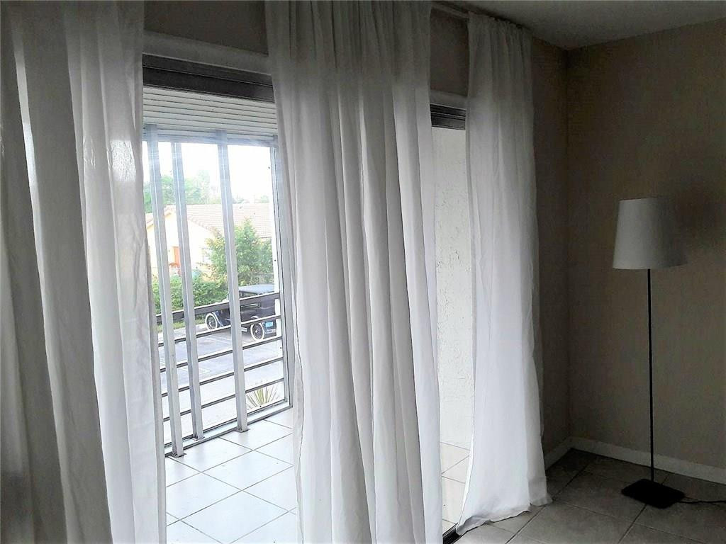 8605 West Sample Road, Unit 211 Coral Springs, FL 33065 - Photo 8 of 31 Screened Balcony
