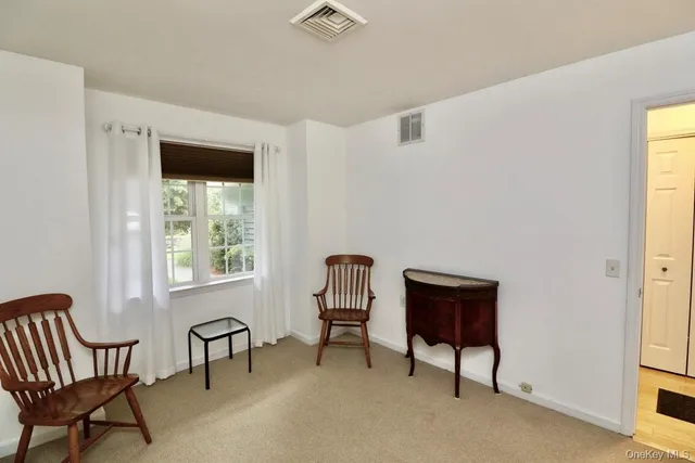 a room with furniture and windows