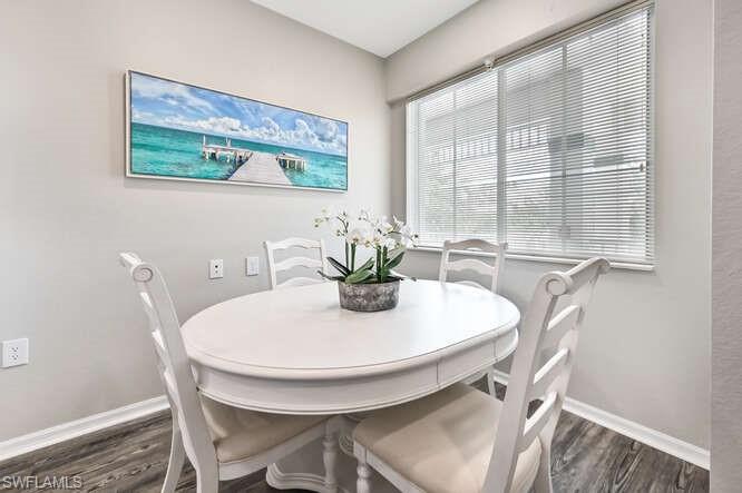 7935 Mahogany Run Lane, Unit 725 Naples, FL 34113 - Photo 7 of 27 a view of a dining room with furniture window and outside view