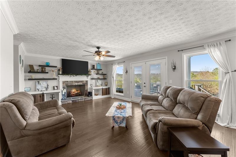 4295 Porter Springs Road Dahlonega, GA 30533 - Photo 15 of 55 a living room with furniture and a flat screen tv
