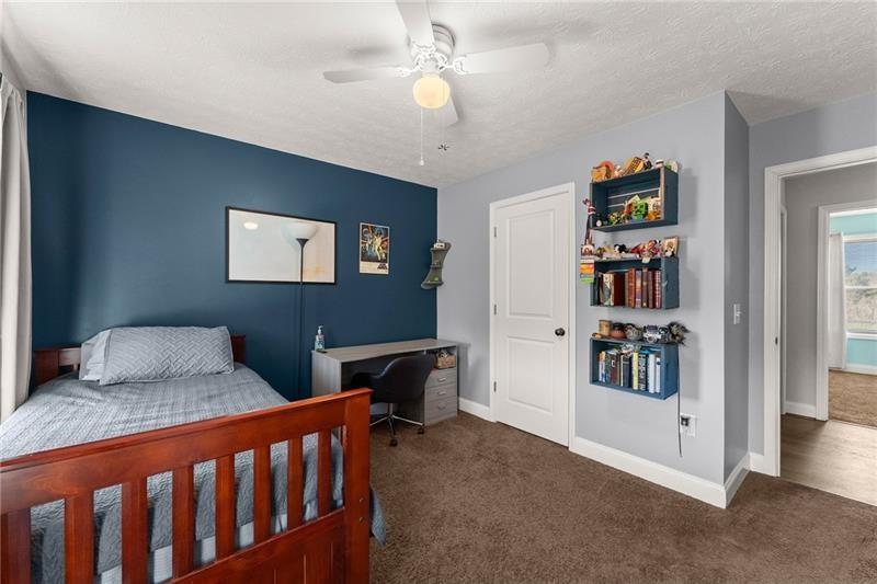 4295 Porter Springs Road Dahlonega, GA 30533 - Photo 20 of 55 a bedroom with furniture and a window