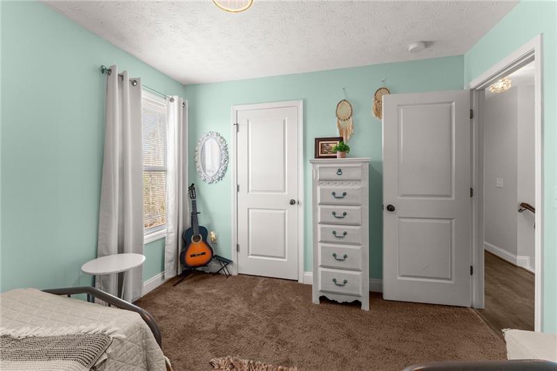 4295 Porter Springs Road Dahlonega, GA 30533 - Photo 22 of 55 a bedroom with a bed and a window