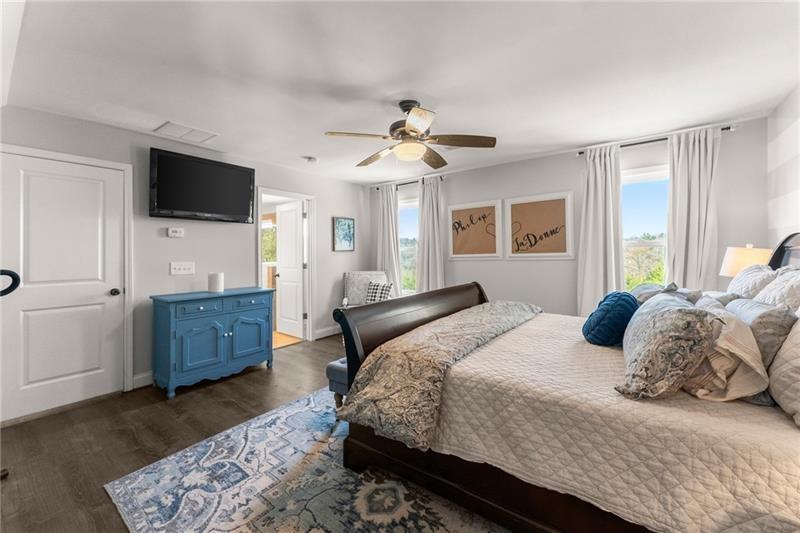 4295 Porter Springs Road Dahlonega, GA 30533 - Photo 26 of 55 a bedroom with a large bed and a flat screen tv