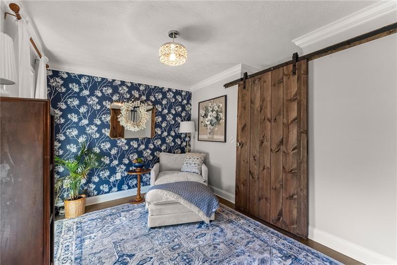 4295 Porter Springs Road Dahlonega, GA 30533 - Photo 9 of 55 a living room with furniture and a flat screen tv