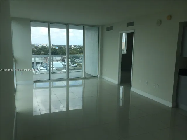 a bathroom with a glass door