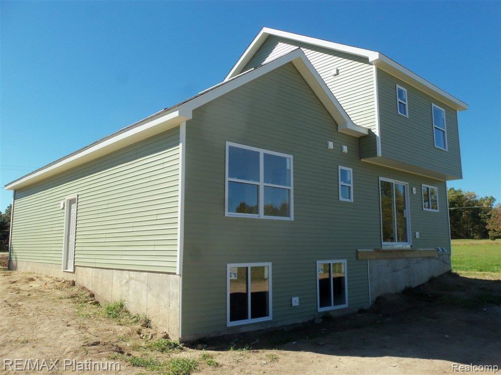 3718 Warner Road Howell, MI 48855 - Photo 3 of 5 warner rear view