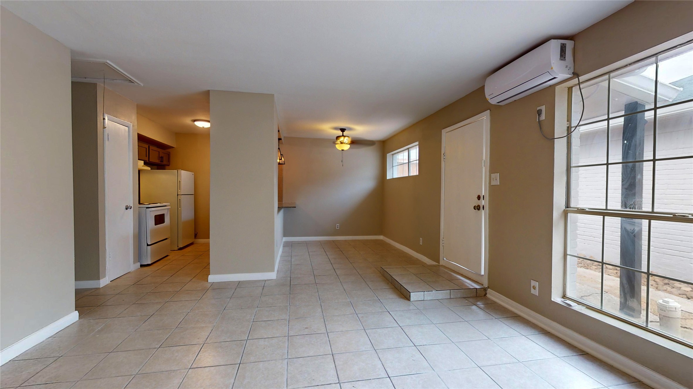 5017 Mallow Street Houston, TX 77033 - Photo 25 of 30 a view of entryway with a bath tub and shower