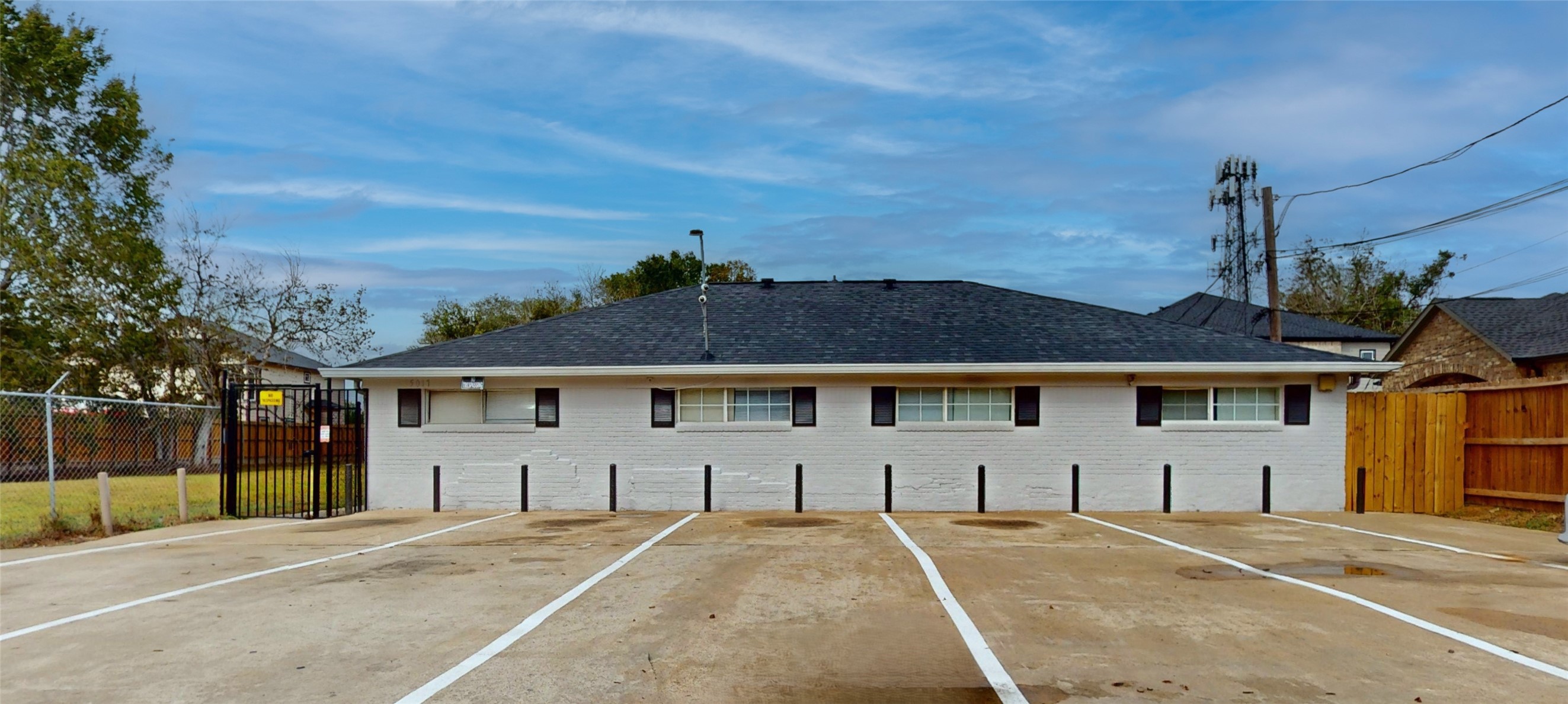 5017 Mallow Street Houston, TX 77033 - Photo 8 of 30 a front view of a house with a garden