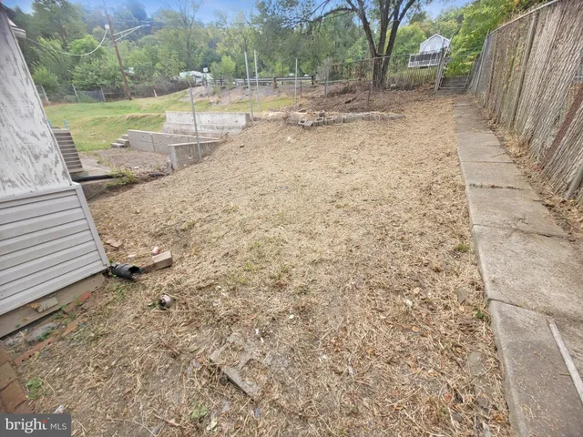 a view of a yard with an outdoor space