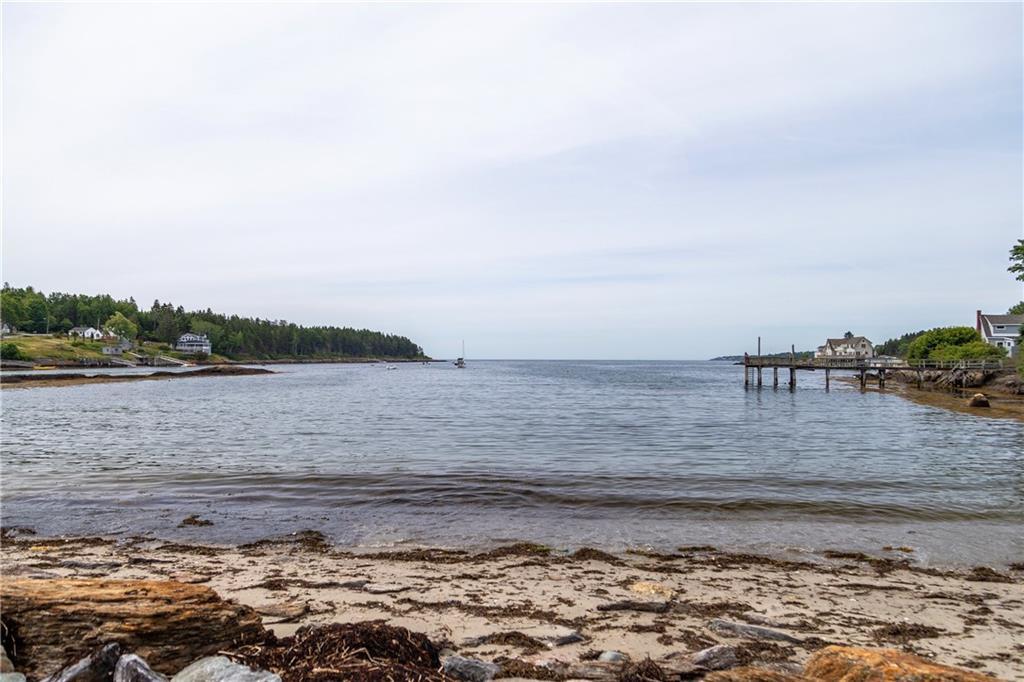 60 Lowells Cove Road Orrs Island, ME 04066 - Photo 21 of 27 A sandy beach will delight young and...