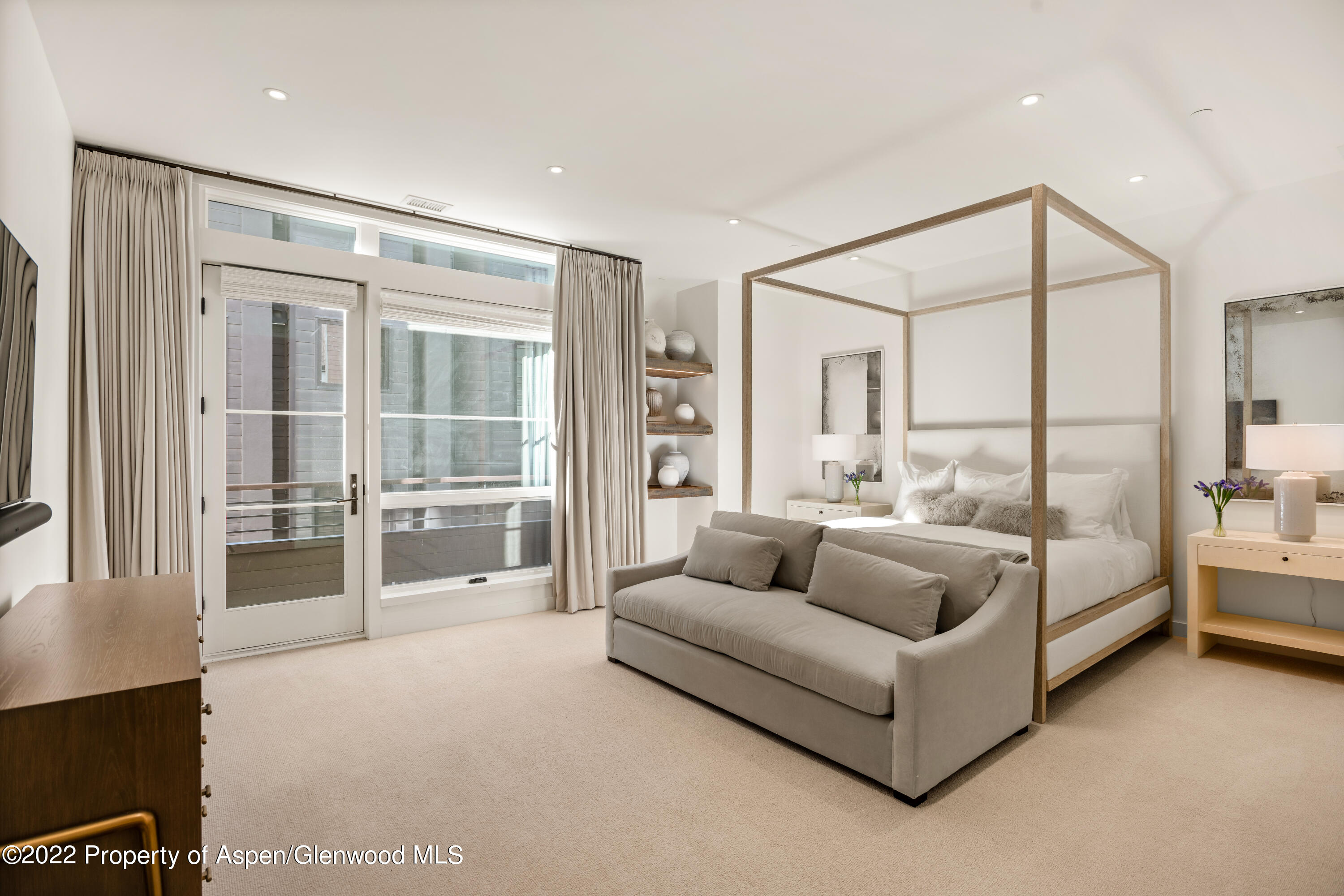 405 South Monarch Street, Unit 209 Aspen, CO 81611 - Photo 11 of 33 a living room with furniture and a large window