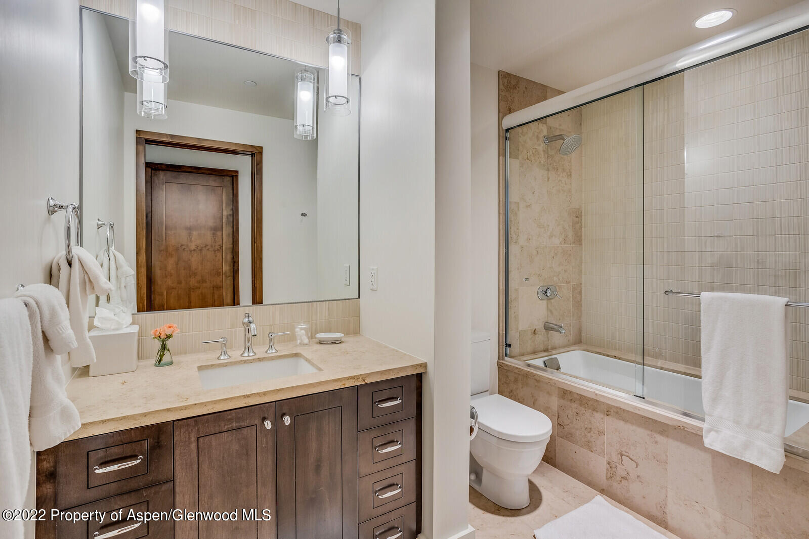 405 South Monarch Street, Unit 209 Aspen, CO 81611 - Photo 21 of 33 a bathroom with a granite countertop sink toilet and shower