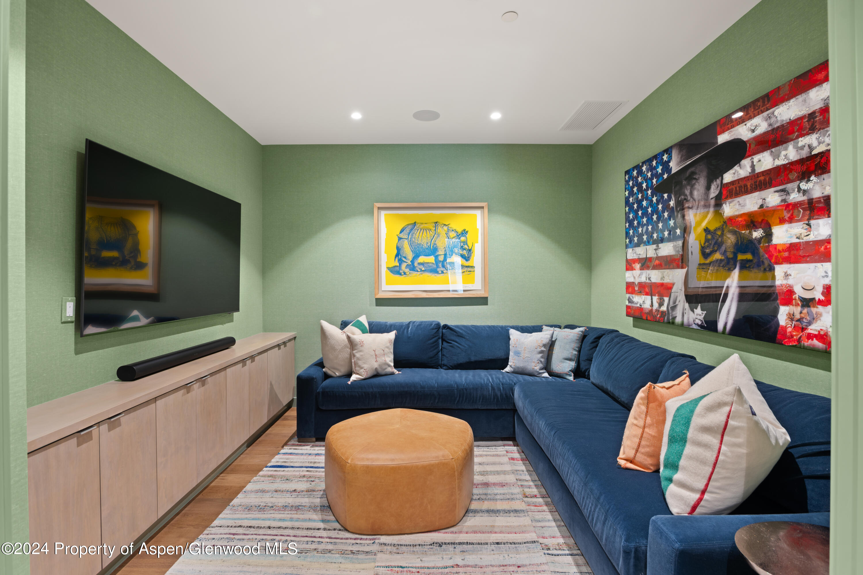 405 South Monarch Street, Unit 209 Aspen, CO 81611 - Photo 22 of 33 a living room with furniture and a flat screen tv
