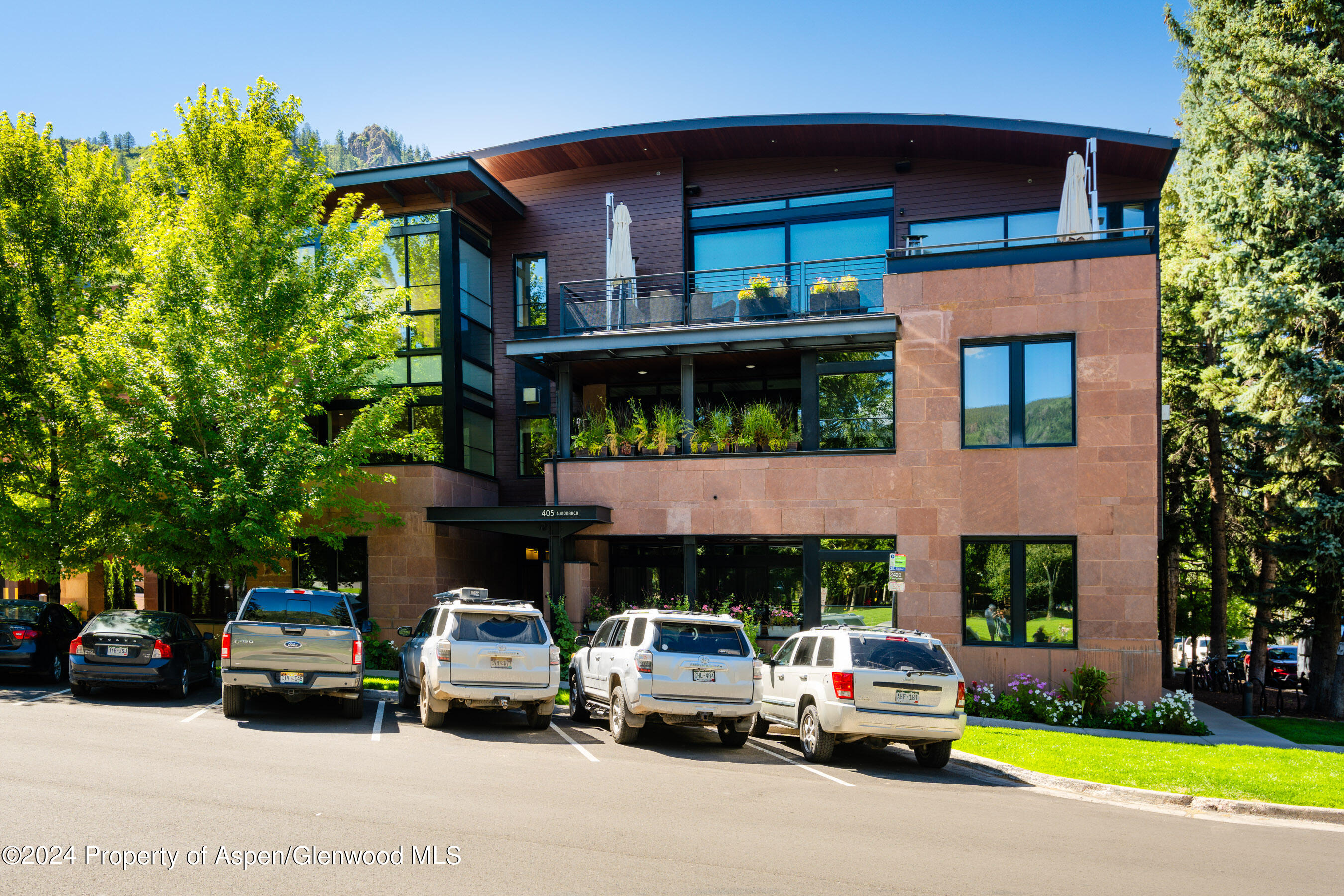 405 South Monarch Street, Unit 209 Aspen, CO 81611 - Photo 33 of 33 a car parked in front of a house