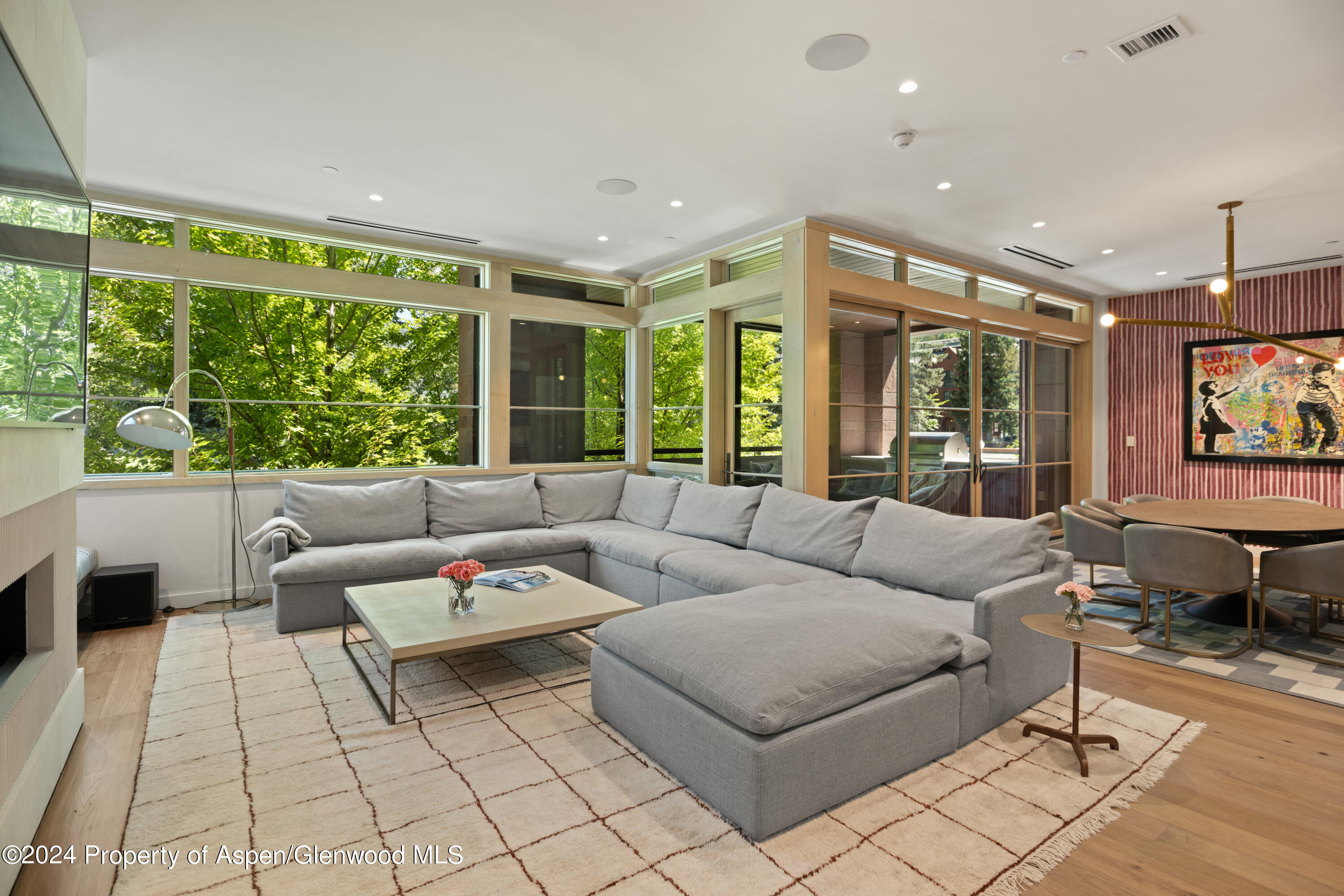 405 South Monarch Street, Unit 209 Aspen, CO 81611 - Photo 4 of 33 a living room with furniture and a large window