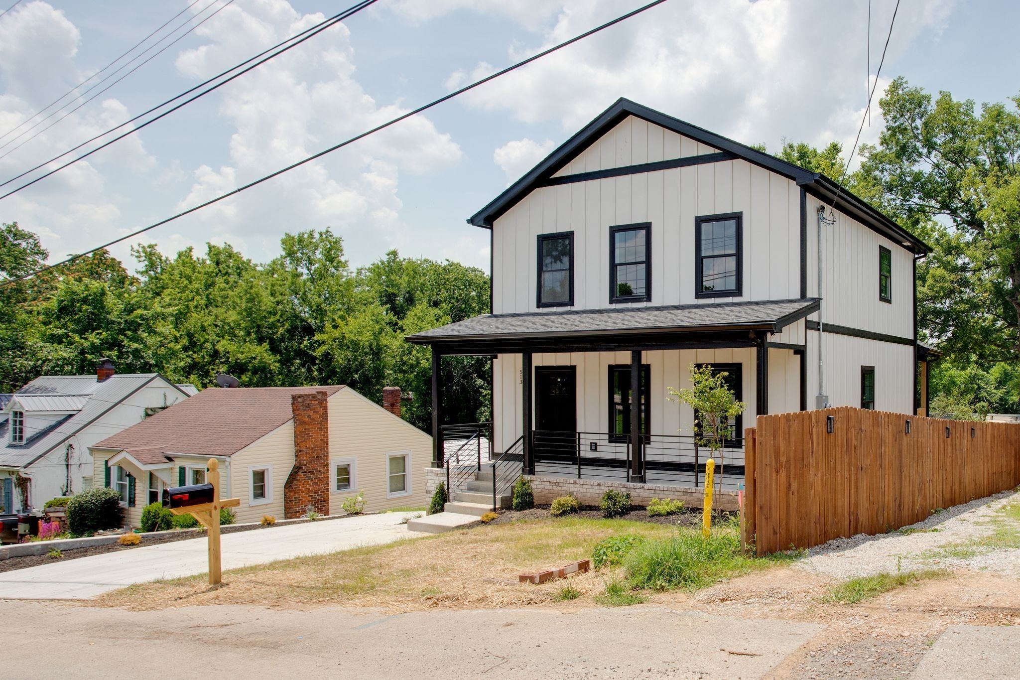 513 Transit Avenue Columbia, TN 38401 - Photo 20 of 26 a white house that has a tree in front of it