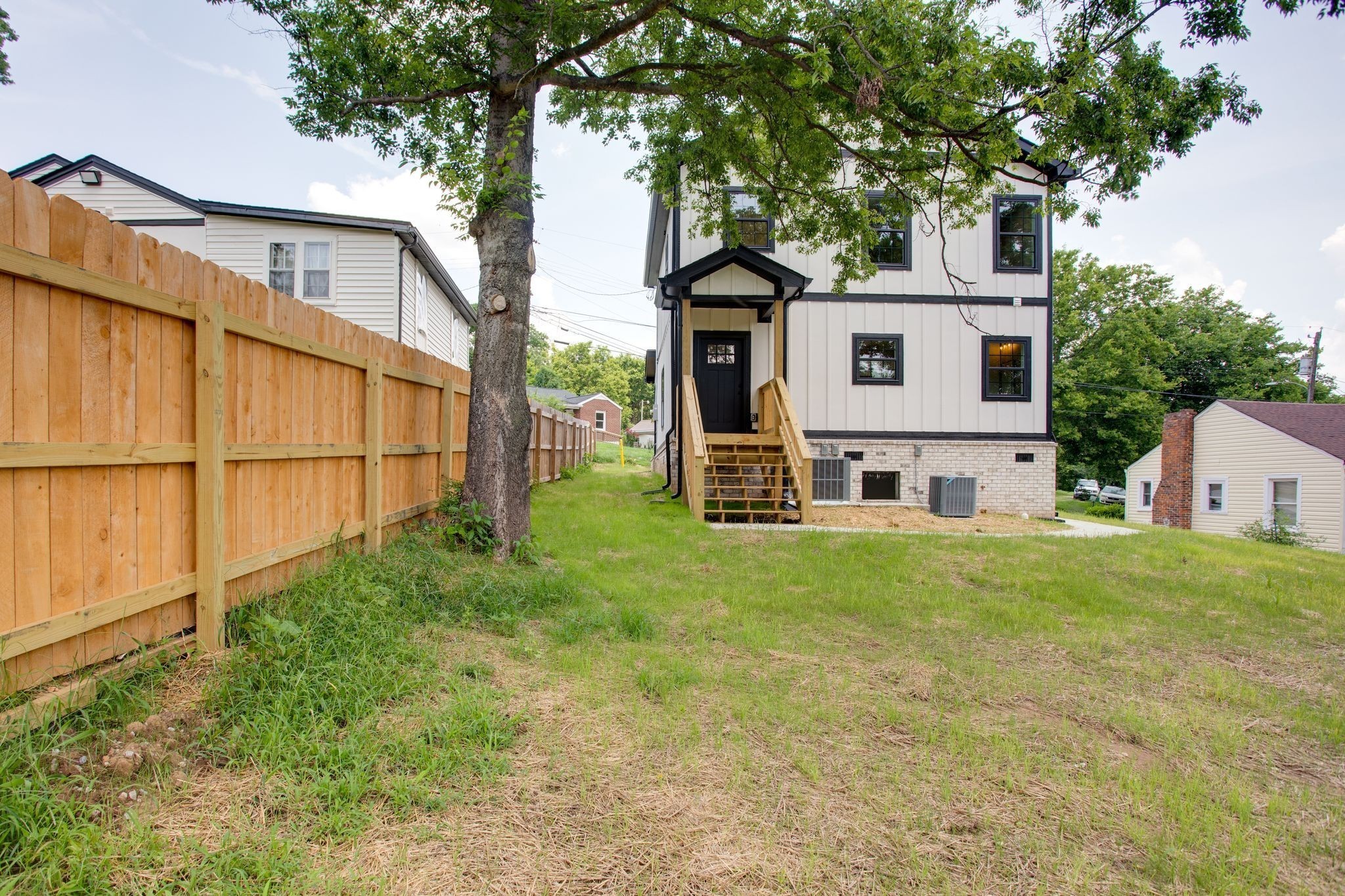 513 Transit Avenue Columbia, TN 38401 - Photo 25 of 26 a view of a yard in front of a house with large trees