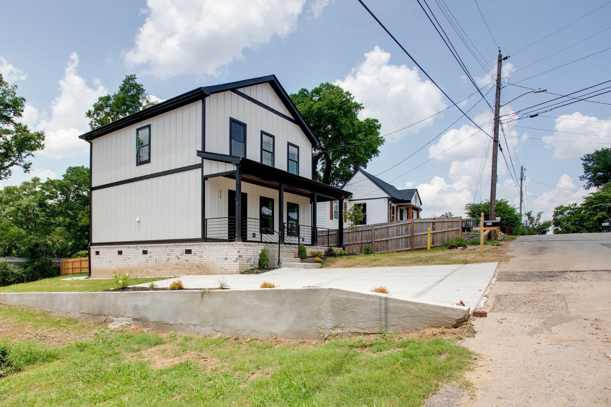 513 Transit Avenue Columbia, TN 38401 - Photo 26 of 26 a view of the house with a yard and plants