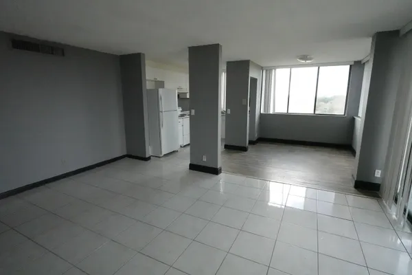 a view of an empty room and window