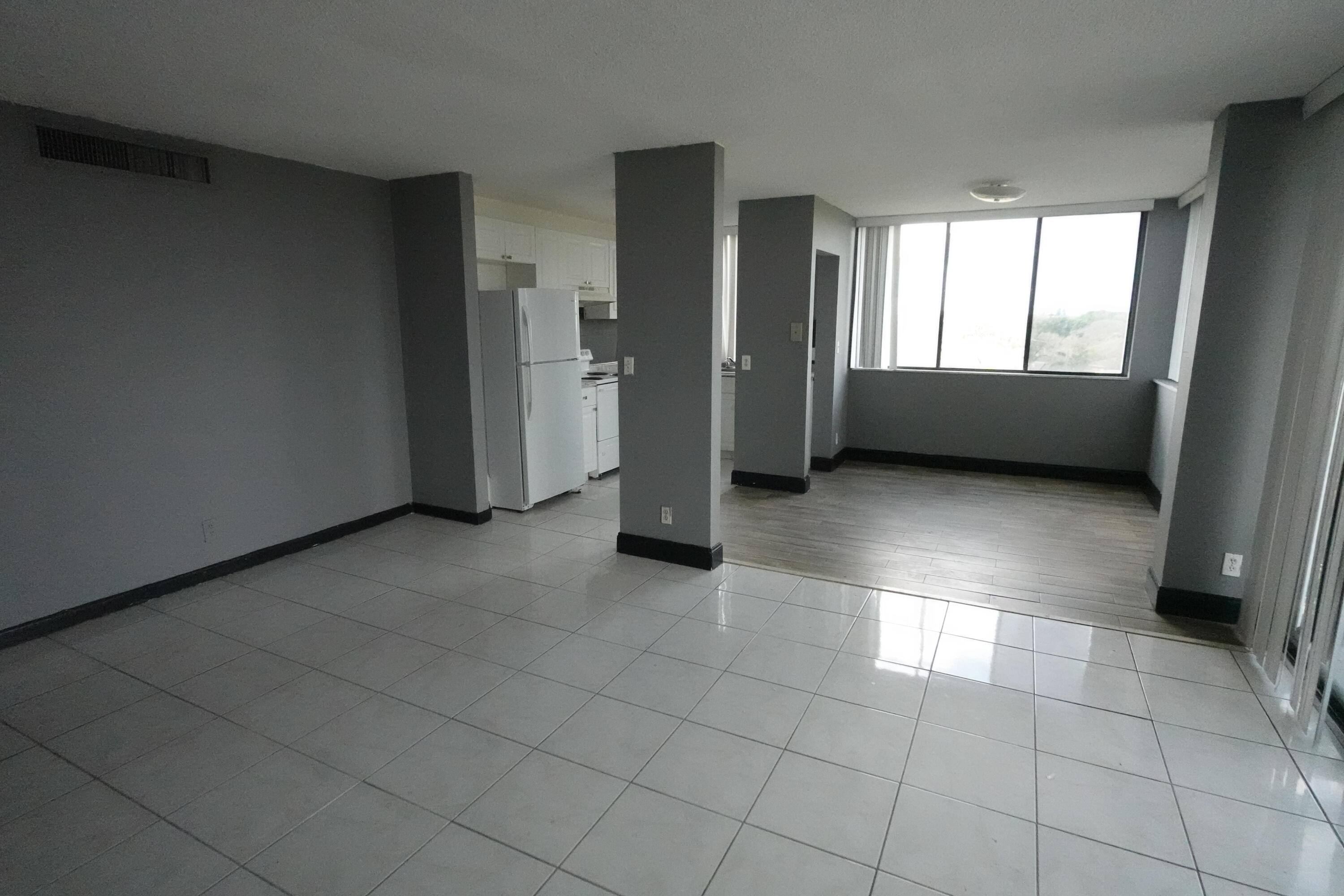 a view of an empty room and window