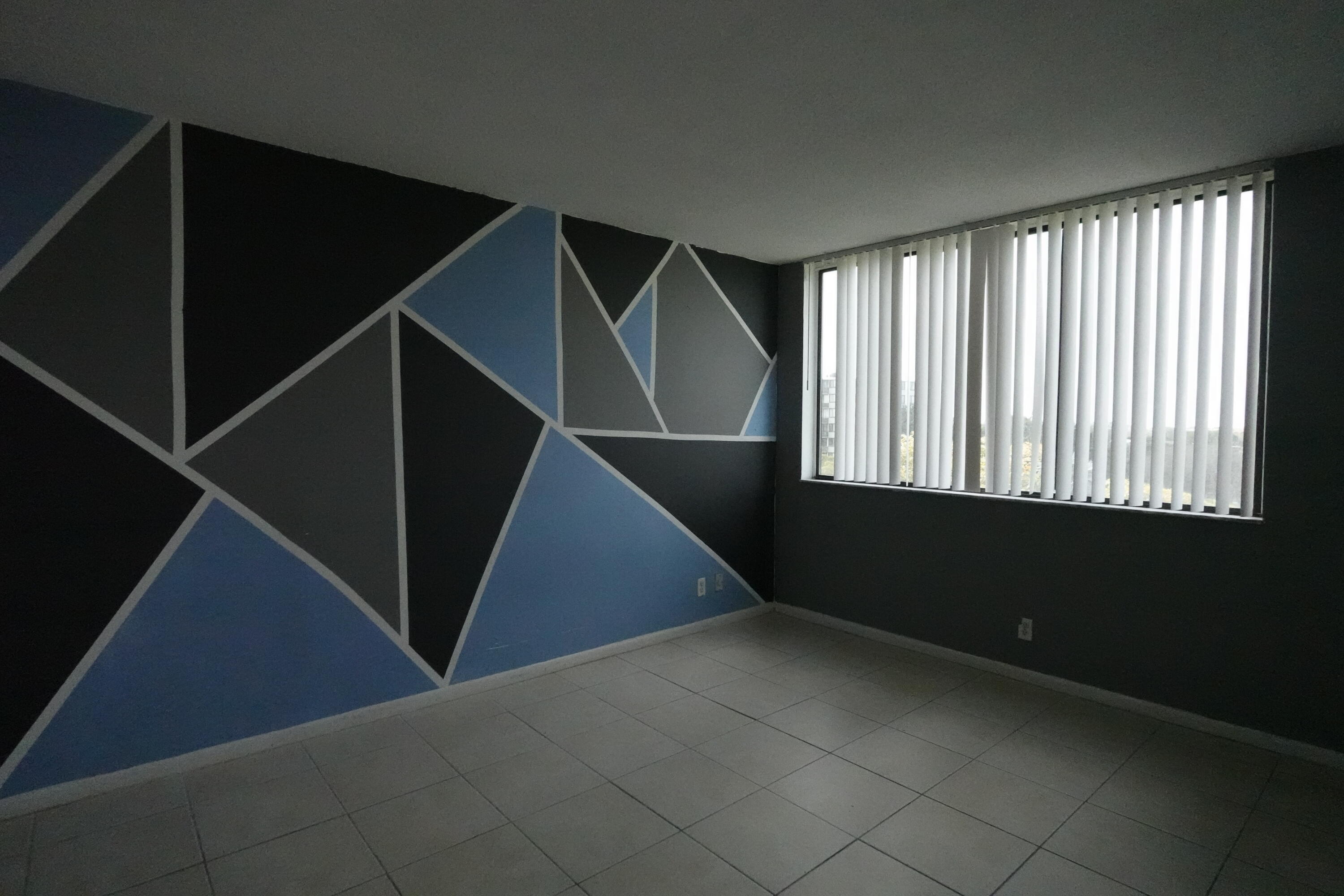 4200 Inverrary Boulevard, Unit 3516 Lauderhill, FL 33319 - Photo 12 of 19 a view of an empty room with windows