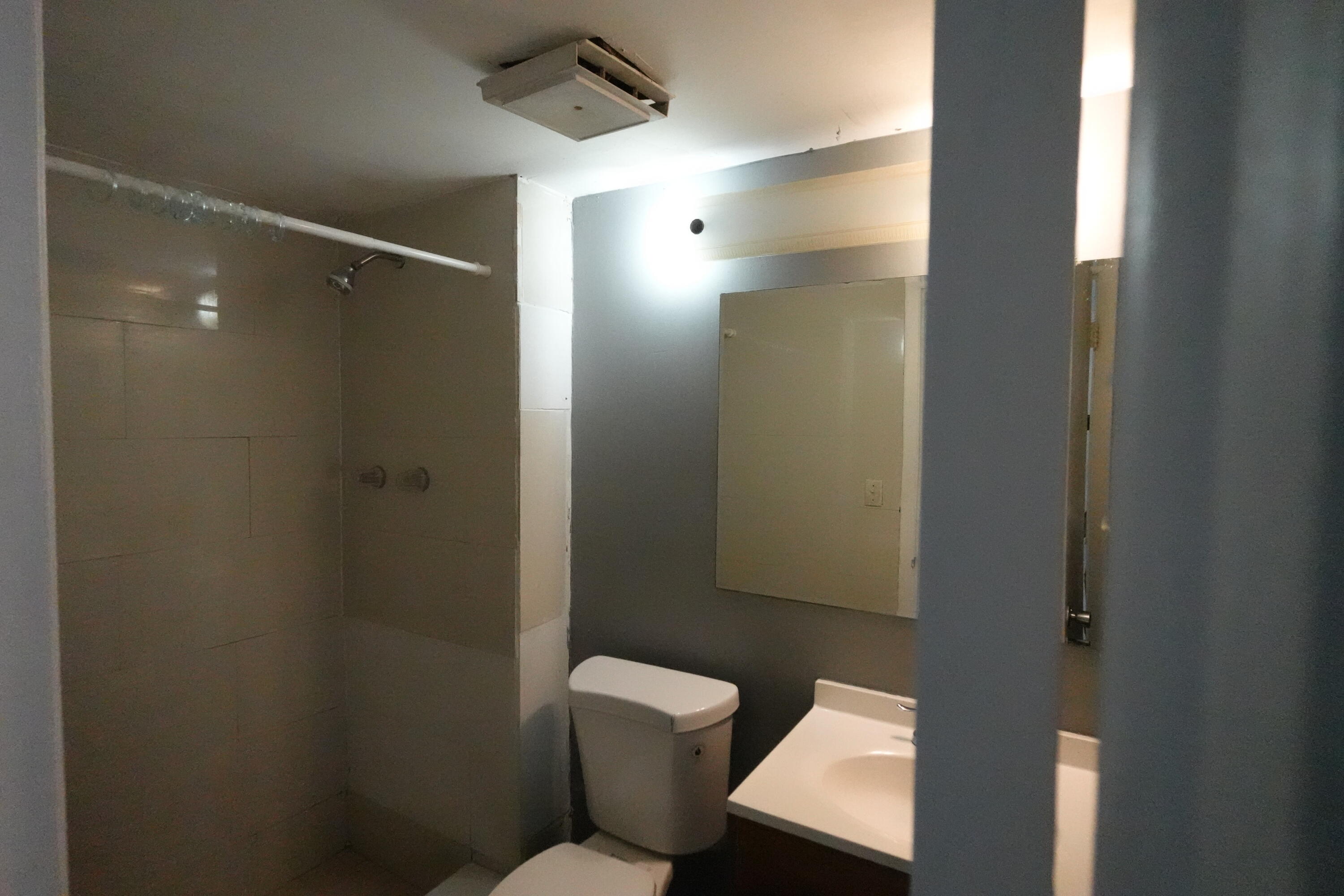 4200 Inverrary Boulevard, Unit 3516 Lauderhill, FL 33319 - Photo 15 of 19 a bathroom with a toilet and a shower