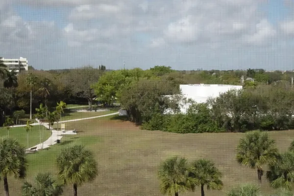 a view of a lake with a yard