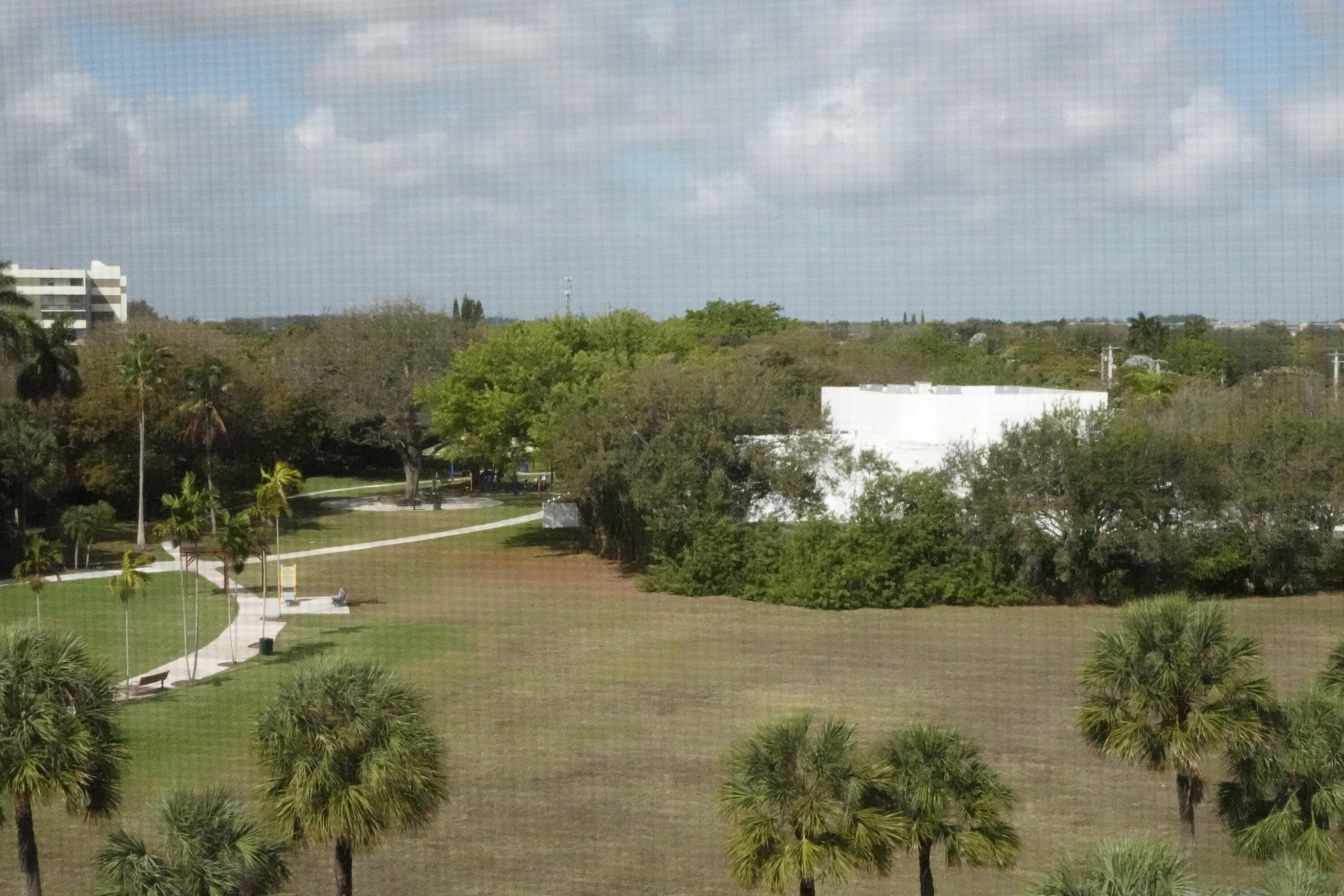 4200 Inverrary Boulevard, Unit 3516 Lauderhill, FL 33319 - Photo 19 of 19 a view of a lake with a yard