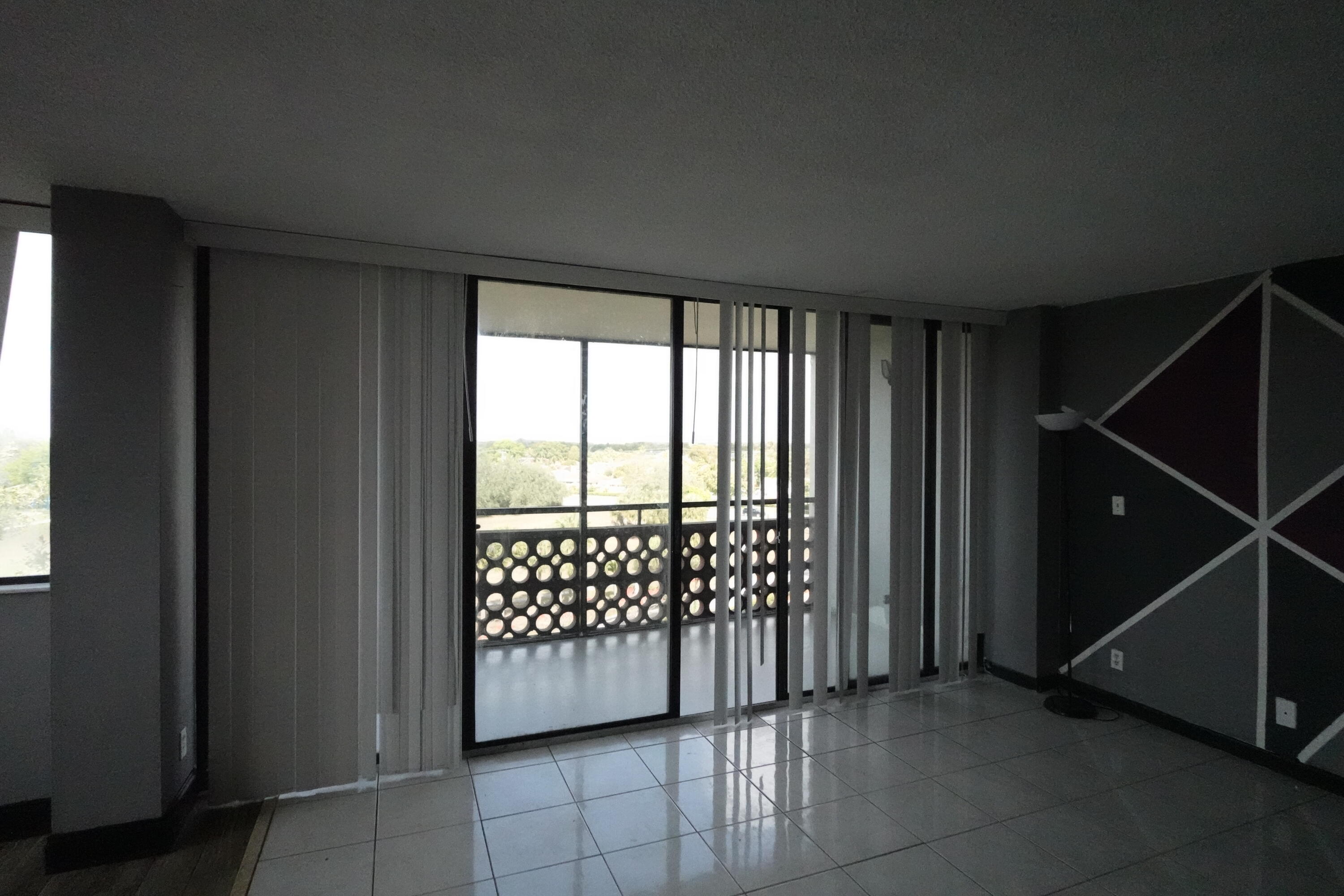 4200 Inverrary Boulevard, Unit 3516 Lauderhill, FL 33319 - Photo 5 of 19 a view of a closet area with an empty room