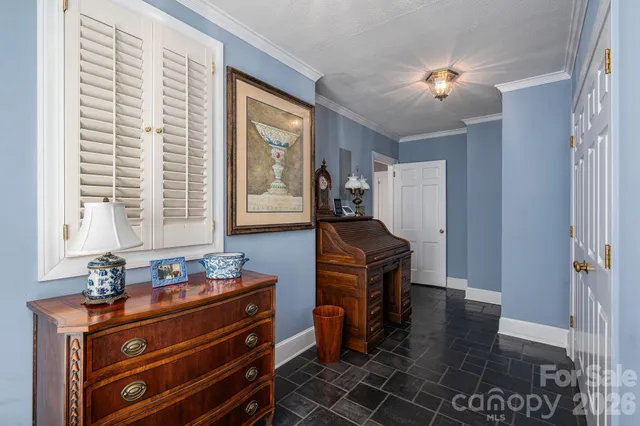 a room with furniture and window