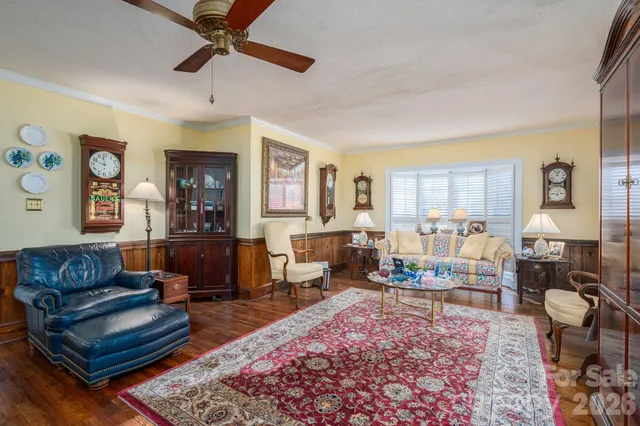 a living room with furniture or couch and a window
