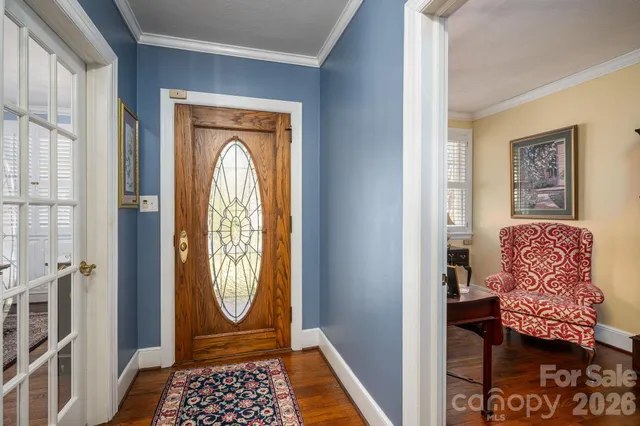 a view of front door with furniture