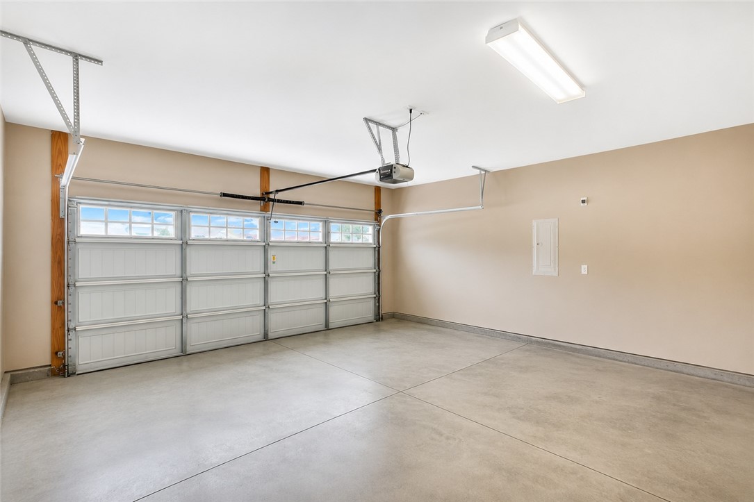 15 Fawn Hill Drive Anderson, SC 29621 - Photo 18 of 38 This spacious two-car garage offers ample parking and storage, featuring a durable concrete floor.