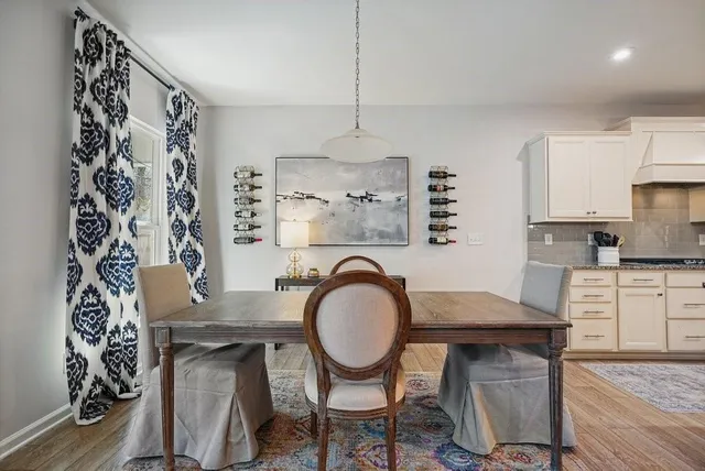 a bathroom with a double vanity sink mirror and toilet