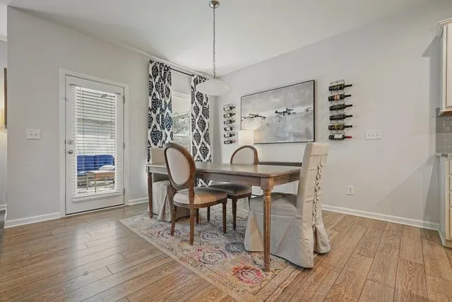 a bathroom with a sink vanity and mirror