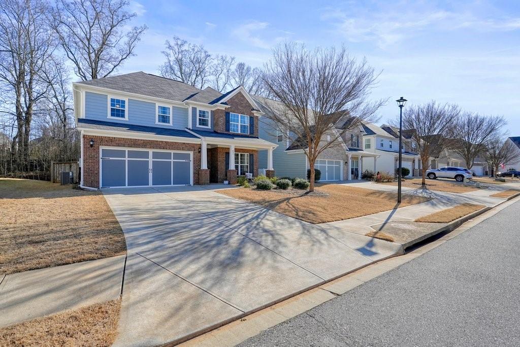 451 Timberleaf Road Canton, GA 30115 - Photo 33 of 38 a swimming pool with outdoor seating and yard