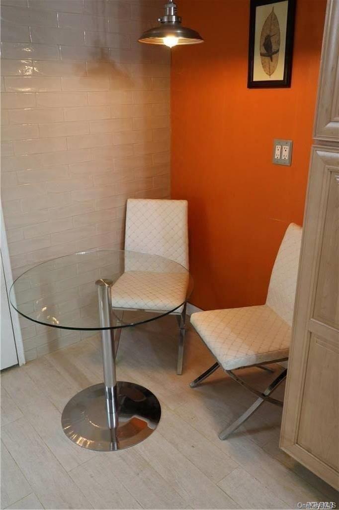 34-10 75th Street, Unit K2 Queens, NY 11372 - Photo 12 of 16 a bathroom with a sink and a toilet