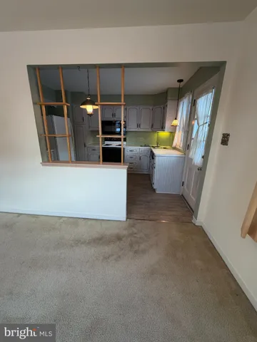 a room with window and stairs