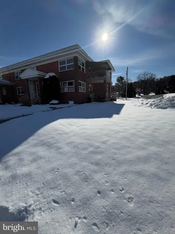 a view of backyard with furniture