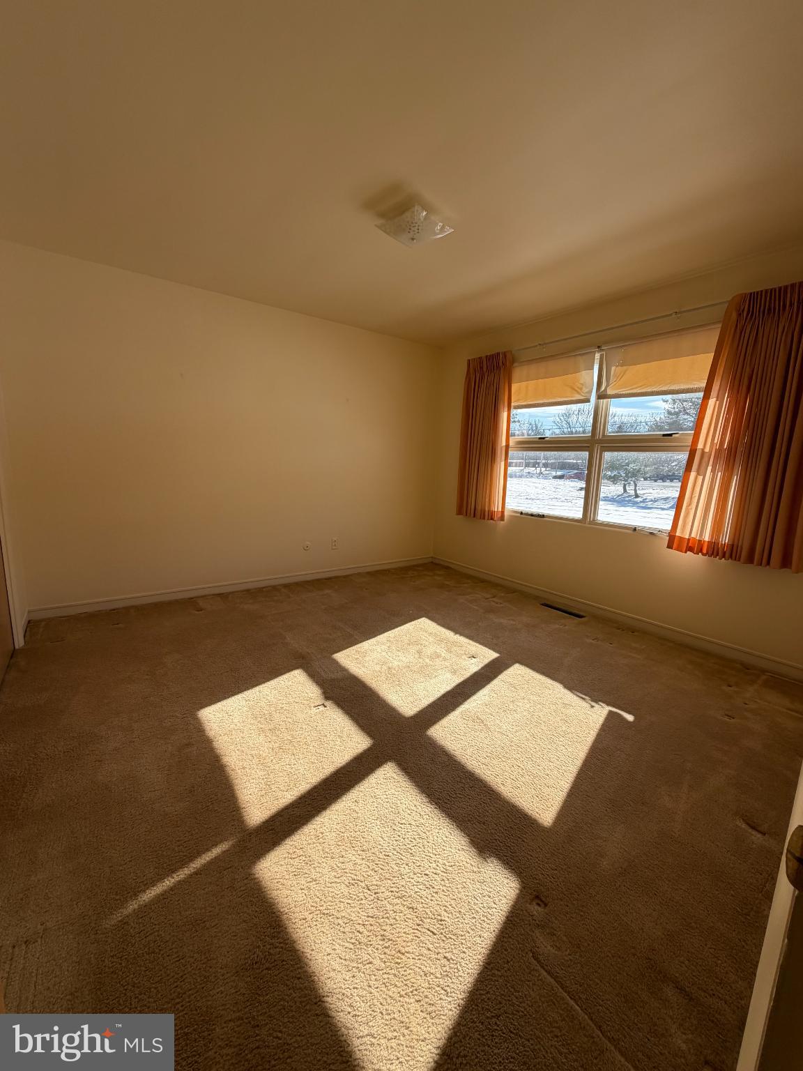 118 Gretchen Drive Reading, PA 19607 - Photo 23 of 33 Sunlit bedroom with inviting warmth and charm.